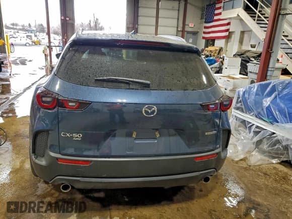 ✅ 2025 Mazda CX-50 S Premium • VIN: 7MMVABDM8SN336819 • Lot: 92750175. Listed on Copart with 10,465 mi. Free auction sales archive from the USA and detailed vehicle history report at DreamBid. Image 6.