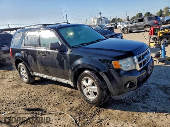 ✅ 2009 Ford Escape XLT • VIN: 1FMCU03719KC81572 • Lot: 95004615. Listed on Copart with 184,827 mi. Free auction sales archive from the USA and detailed vehicle history report at DreamBid. Image 4.