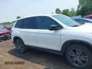 ✅ 2021 Honda Passport EX-L • VIN: 5FNYF8H59MB007097 • Lot: 42409181. Listed on IAAI with 74,410 mi. Free auction sales archive from the USA and detailed vehicle history report at DreamBid. Image 13.