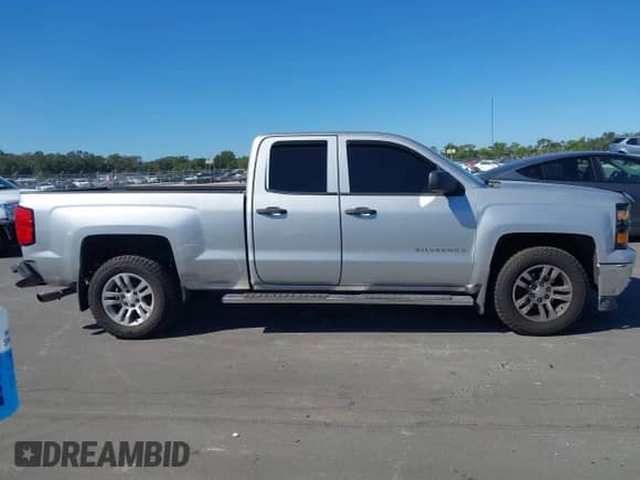 2014 Chevrolet Silverado 1500 LT z VIN 1GCRCREH9EZ321345, wystawiony jako IAAI lot #43542809 z przebiegiem 140 258 mil mil oraz . Historia ofert i sprzedaży dostępna na DreamBid. Obrazek 13.