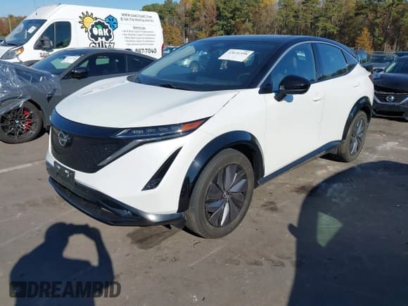 ✅ 2023 Nissan ARIYA Evolve+ • VIN: JN1BF0BA3PM411556 • Lot: 43631598. Listed on IAAI with 17,063 mi. Free auction sales archive from the USA and detailed vehicle history report at DreamBid. Image 2.