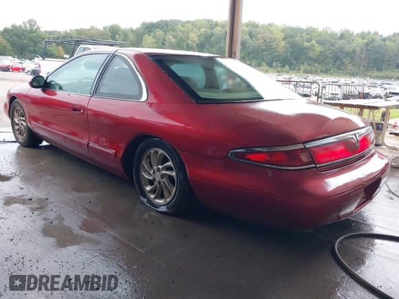 ✅ 1998 Lincoln Mark VIII • VIN: 1LNFM91V6WY620063 • Lot: 43316854. Wystawiony na IAAI z przebiegiem Nie podano. Bezpłatny archiwum sprzedaży aukcyjnych z USA i szczegółowy raport historii pojazdu na DreamBid. Zdjęcie 3.