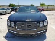 ✅ 2014 Bentley Flying Spur • VIN: SCBEC9ZA8EC088818 • Lot: 61191335. Wystawiony na Copart z przebiegiem 26 781 mil. Bezpłatny archiwum sprzedaży aukcyjnych z USA i szczegółowy raport historii pojazdu na DreamBid. Zdjęcie 5.