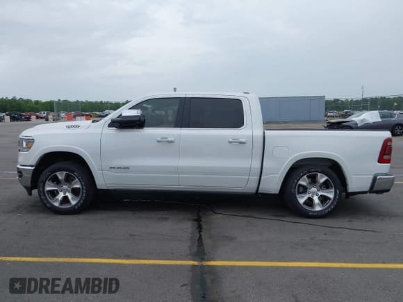 ✅ 2021 Ram 1500 Laramie • VIN: 1C6RREJT1MN709653 • Lot: 41951192. Listed on IAAI with 39,688 mi. Free auction sales archive from the USA and detailed vehicle history report at DreamBid. Image 14.