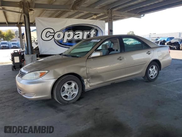 ✅ 2002 Toyota Camry XLE • VIN: 4T1BF30K12U017651 • Lot: 91111705. Wystawiony na Copart z przebiegiem 126 517 mil. Bezpłatny archiwum sprzedaży aukcyjnych z USA i szczegółowy raport historii pojazdu na DreamBid. Zdjęcie 1.