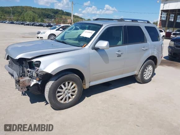 2010 Mercury Mariner Premier z VIN 4M2CN9HGXAKJ16116, wystawiony jako IAAI lot #43140056 z przebiegiem 194 370 mil mil oraz . Historia ofert i sprzedaży dostępna na DreamBid. Obrazek 2.