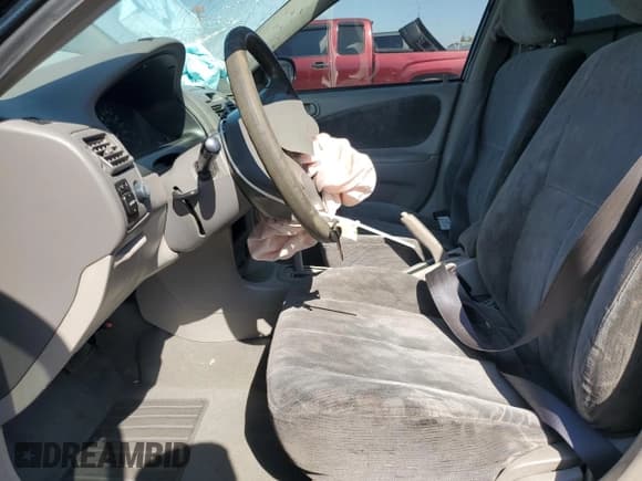 ✅ 1999 Toyota Corolla LE • VIN: 1NXBR12E8XZ242417 • Lot: 86141885. Wystawiony na Copart z przebiegiem 153 765 mil. Bezpłatny archiwum sprzedaży aukcyjnych z USA i szczegółowy raport historii pojazdu na DreamBid. Zdjęcie 7.