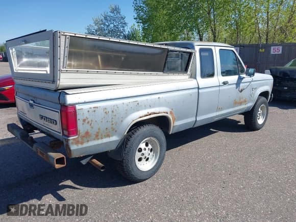 ✅ 1987 Ford Ranger • VIN: 1FTCR15T5HPB40124 • Lot: 42177557. Listed on IAAI with 7,957 mi. Free auction sales archive from the USA and detailed vehicle history report at DreamBid. Image 4.