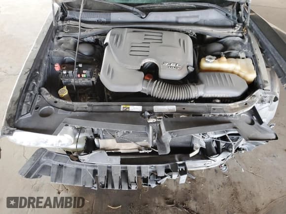 ✅ 2013 Dodge Challenger SXT • VIN: 2C3CDYAG2DH620026 • Lot: 42370555. Wystawiony na Copart z przebiegiem 117 987 mil. Bezpłatny archiwum sprzedaży aukcyjnych z USA i szczegółowy raport historii pojazdu na DreamBid. Zdjęcie 11.