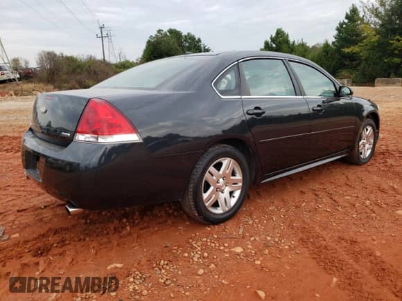 2013 Chevrolet Impala LT с VIN 2G1WG5E39D1139875, выставлен на аукционе Copart как лот 81767605 с пробегом 164 756 миль миль и Списание • Salvage title. История ставок и продаж доступна на DreamBid. Изображение 3.