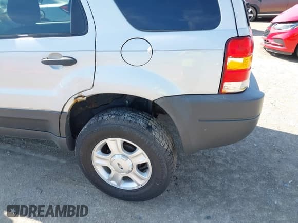 ✅ 2004 Ford Escape XLT • VIN: 1FMYU931X4KB19082 • Lot: 42844876. Listed on IAAI with 86,428 mi. Free auction sales archive from the USA and detailed vehicle history report at DreamBid. Image 6.