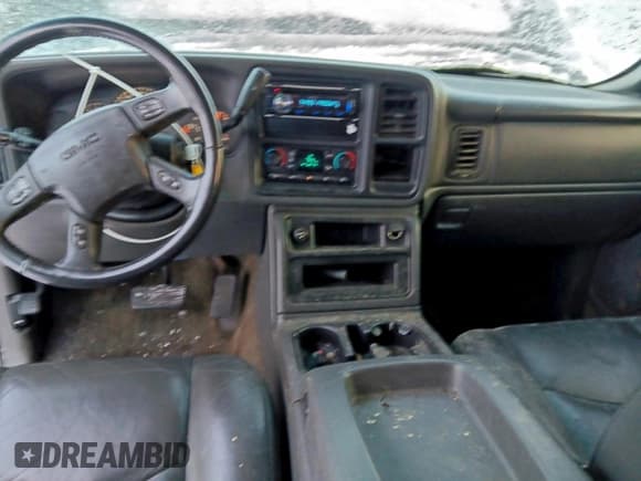 ✅ 2005 GMC Sierra 1500 SLT • VIN: 1GTEK19B15Z202584 • Лот: 94100465. Опубликован ранее на Copart с пробегом 206 580 миль. Бесплатный доступ к архиву аукционных продаж из США и подробный отчёт об истории автомобиля на DreamBid. Изображение 8.