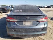 ✅ 2018 Ford Fusion Titanium • VIN: 3FA6P0D96JR234004 • Lot: 86815465. Wystawiony na Copart z przebiegiem 205 379 mil. Bezpłatny archiwum sprzedaży aukcyjnych z USA i szczegółowy raport historii pojazdu na DreamBid. Zdjęcie 6.