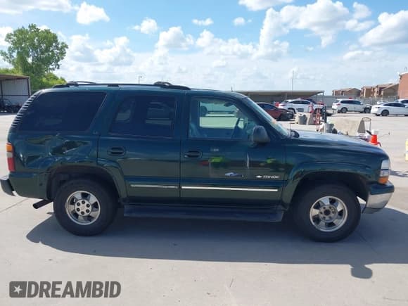 ✅ 2002 Chevrolet Tahoe LT • VIN: 1GNEC13Z42J343170 • Lot: 42595305. Listed on IAAI with 383,405 mi. Free auction sales archive from the USA and detailed vehicle history report at DreamBid. Image 13.