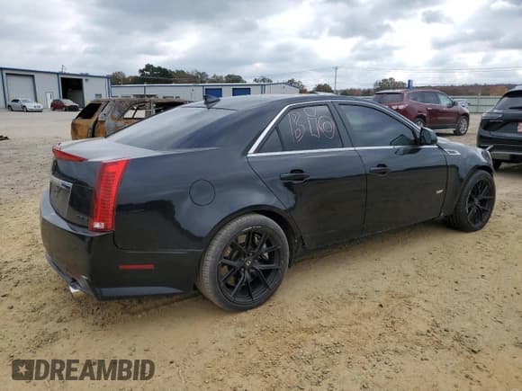 ✅ 2009 Cadillac CTS-V • VIN: 1G6DN57P190166143 • Lot: 91059895. Listed on Copart with 188,471 mi. Free auction sales archive from the USA and detailed vehicle history report at DreamBid. Image 3.
