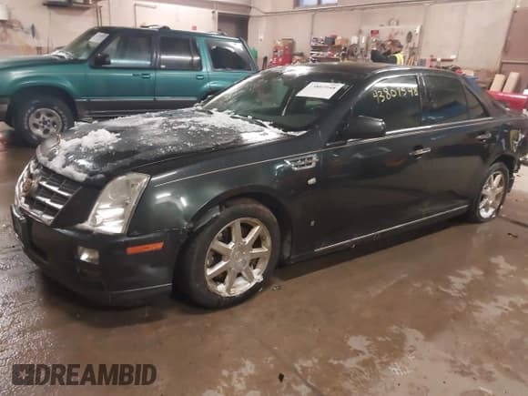✅ 2008 Cadillac STS AWD • VIN: 1G6DD67V280164813 • Lot: 43807548. Listed on IAAI with Not provided. Free auction sales archive from the USA and detailed vehicle history report at DreamBid. Image 2.