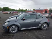 ✅ 2014 Volkswagen Beetle 1.8T • VIN: 3VWJ17AT4EM640278 • Lot: 42198194. Listed on IAAI with 136,096 mi. Free auction sales archive from the USA and detailed vehicle history report at DreamBid. Image 14.