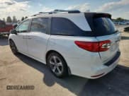 ✅ 2018 Honda Odyssey Touring • VIN: 5FNRL6H88JB027123 • Lot: 85131975. Wystawiony na Copart z przebiegiem 116 711 mil. Bezpłatny archiwum sprzedaży aukcyjnych z USA i szczegółowy raport historii pojazdu na DreamBid. Zdjęcie 2.