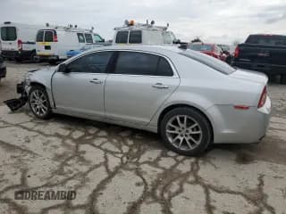 ✅ 2012 Chevrolet Malibu LTZ • VIN: 1G1ZG5E72CF117904 • Lot: 52998884. Listed on Copart with 138,605 mi. Free auction sales archive from the USA and detailed vehicle history report at DreamBid. Image 2.