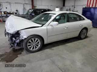 2006 Hyundai Azera SE z VIN KMHFC46F16A119307, wystawiony jako Copart lot #66406184 z przebiegiem 154 584 mil mil oraz Czysty tytuł • Clean title. Historia ofert i sprzedaży dostępna na DreamBid. Obrazek 1.