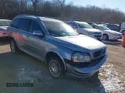 ✅ 2013 Volvo XC90 R-Design • VIN: YV4952CT4D1646245 • Lot: 41200203. Listed on IAAI with 139,824 mi. Free auction sales archive from the USA and detailed vehicle history report at DreamBid. Image 1.