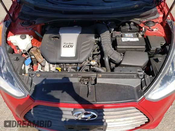 2014 Hyundai Veloster Turbo z VIN KMHTC6AE0EU200020, wystawiony jako Copart lot #68376134 z przebiegiem 90 733 mil mil oraz Szkoda całkowita • Salvage title. Historia ofert i sprzedaży dostępna na DreamBid. Obrazek 13.