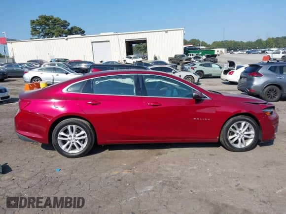 2018 Chevrolet Malibu LT z VIN 1G1ZD5ST9JF187469, wystawiony jako IAAI lot #43236407 z przebiegiem 228 997 mil mil oraz . Historia ofert i sprzedaży dostępna na DreamBid. Obrazek 13.
