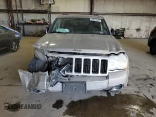 ✅ 2010 Jeep Grand Cherokee Laredo • VIN: 1J4PR4GK5AC160128 • Лот: 90378635. Опубликован ранее на Copart с пробегом 183 471 миль. Бесплатный доступ к архиву аукционных продаж из США и подробный отчёт об истории автомобиля на DreamBid. Изображение 5.