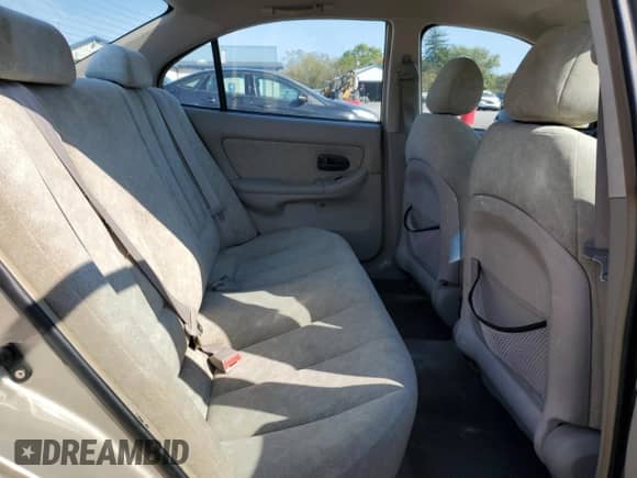 2002 Hyundai Elantra GLS z VIN KMHDN45D42U421622, wystawiony jako Copart lot #75853664 z przebiegiem 57 595 mil mil oraz Czysty tytuł • Clean title. Historia ofert i sprzedaży dostępna na DreamBid. Obrazek 10.