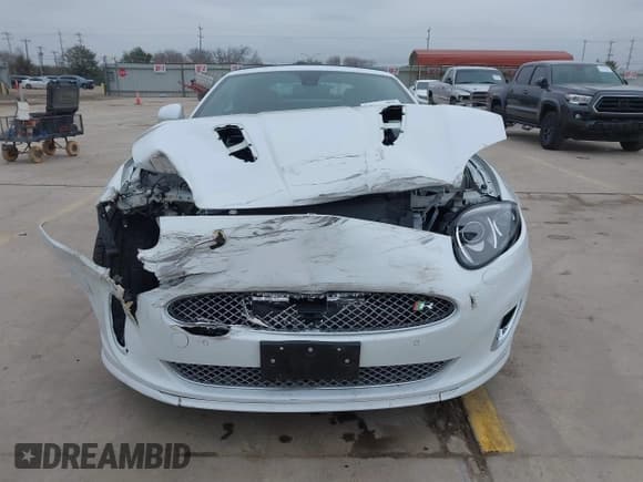 ✅ 2014 Jaguar XK XKR • VIN: SAJWA4EC9EMB52042 • Lot: 41635233. Listed on IAAI with 10,566 mi. Free auction sales archive from the USA and detailed vehicle history report at DreamBid. Image 12.