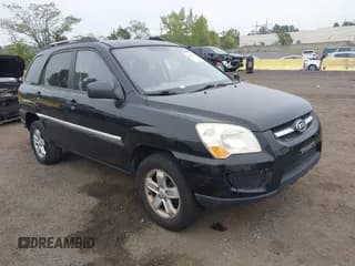 ✅ 2009 Kia Sportage EX • VIN: KNDJF723X97636531 • Лот: 43293955. Опубликован ранее на IAAI с пробегом 82 016 миль. Бесплатный доступ к архиву аукционных продаж из США и подробный отчёт об истории автомобиля на DreamBid. Изображение 1.