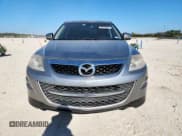 ✅ 2012 Mazda CX-9 Grand Touring • VIN: JM3TB2DA4C0333402 • Lot: 92898095. Wystawiony na Copart z przebiegiem 123 320 mil. Bezpłatny archiwum sprzedaży aukcyjnych z USA i szczegółowy raport historii pojazdu na DreamBid. Zdjęcie 5.