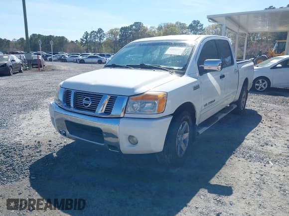 ✅ 2011 Nissan Titan SL • VIN: 1N6BA0ED0BN322450 • Lot: 41885929. Listed on IAAI with 340,922 mi. Free auction sales archive from the USA and detailed vehicle history report at DreamBid. Image 2.