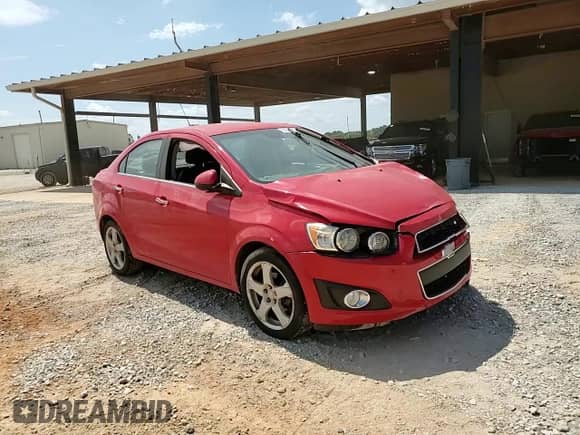 2015 Chevrolet Sonic LTZ с VIN 1G1JE5SB9F4204257, выставлен на аукционе Copart как лот 62955724 с пробегом Не указан миль и Списание • Salvage title. История ставок и продаж доступна на DreamBid. Изображение 10.