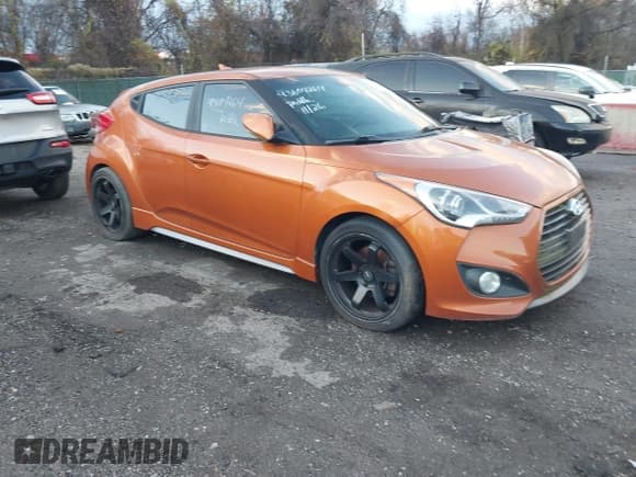 ✅ 2013 Hyundai Veloster Turbo • VIN: KMHTC6AE1DU180195 • Lot: 43804264. Listed on IAAI with 139,844 mi. Free auction sales archive from the USA and detailed vehicle history report at DreamBid. Image 1.