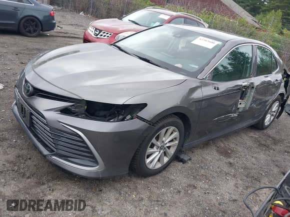 2021 Toyota Camry LE with VIN 4T1C11BK5MU028031, listed as a IAAI auction lot 42502600 with 115,138 mi miles and . Bid and sale history available at DreamBid. Image 19.