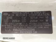 ✅ 2004 Kia Amanti • VIN: KNALD124X45023346 • Lot: 43012500. Wystawiony na IAAI z przebiegiem 98 435 mil. Bezpłatny archiwum sprzedaży aukcyjnych z USA i szczegółowy raport historii pojazdu na DreamBid. Zdjęcie 9.