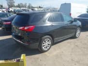 ✅ 2018 Chevrolet Equinox LT • VIN: 2GNAXJEVXJ6283534 • Lot: 43512156. Listed on IAAI with 105,451 mi. Free auction sales archive from the USA and detailed vehicle history report at DreamBid. Image 4.