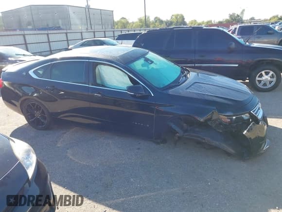 ✅ 2015 Chevrolet Impala LT • VIN: 1G1125S34FU126634 • Lot: 43589740. Listed on IAAI with 135,706 mi. Free auction sales archive from the USA and detailed vehicle history report at DreamBid. Image 14.