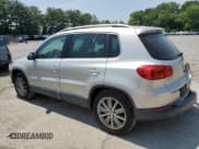 ✅ 2012 Volkswagen Tiguan LE • VIN: WVGAV7AX4CW556996 • Lot: 59082515. Listed on Copart with 131,394 mi. Free auction sales archive from the USA and detailed vehicle history report at DreamBid. Image 2.