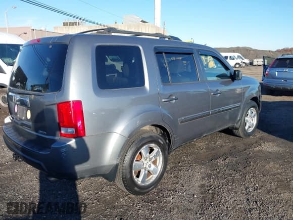 ✅ 2009 Honda Pilot EX-L • VIN: 5FNYF48549B036362 • Lot: 43711152. Listed on IAAI with 266,584 mi. Free auction sales archive from the USA and detailed vehicle history report at DreamBid. Image 4.