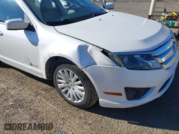 ✅ 2012 Ford Fusion Hybrid • VIN: 3FADP0L36CR414428 • Lot: 43462972. Listed on IAAI with 198,121 mi. Free auction sales archive from the USA and detailed vehicle history report at DreamBid. Image 6.