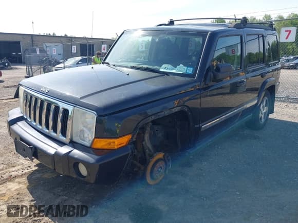 ✅ 2010 Jeep Commander Sport • VIN: 1J4RG4GK2AC118126 • Lot: 42345486. Listed on IAAI with 154,376 mi. Free auction sales archive from the USA and detailed vehicle history report at DreamBid. Image 6.