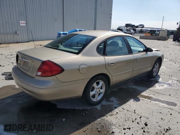 ✅ 2001 Ford Taurus SES • VIN: 1FAFP552X1A252207 • Lot: 70060065. Listed on Copart with 122,253 mi. Free auction sales archive from the USA and detailed vehicle history report at DreamBid. Image 3.