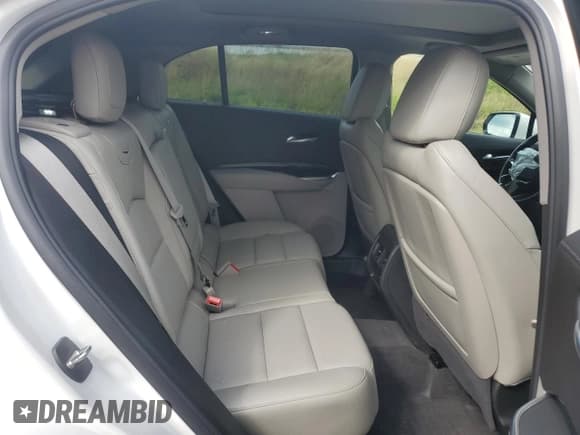 ✅ 2022 Cadillac XT4 AWD Premium Luxury • VIN: 1GYFZDR44NF100839 • Лот: 71855425. Опубликован ранее на Copart с пробегом 25 851 миль. Бесплатный доступ к архиву аукционных продаж из США и подробный отчёт об истории автомобиля на DreamBid. Изображение 11.