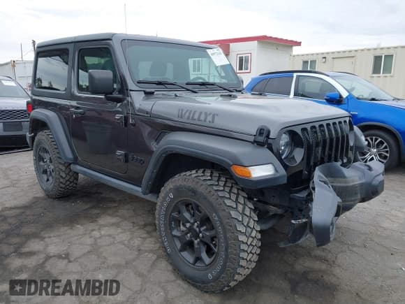 ✅ 2022 Jeep Wrangler Willys Sport • VIN: 1C4GJXAN7NW252931 • Lot: 40972143. Listed on IAAI with 12,823 mi. Free auction sales archive from the USA and detailed vehicle history report at DreamBid. Image 1.