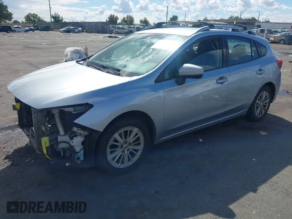 ✅ 2018 Subaru Impreza Premium • VIN: 4S3GTAD63J3705501 • Лот: 43359124. Опубликован ранее на IAAI с пробегом 128 534 миль. Бесплатный доступ к архиву аукционных продаж из США и подробный отчёт об истории автомобиля на DreamBid. Изображение 2.
