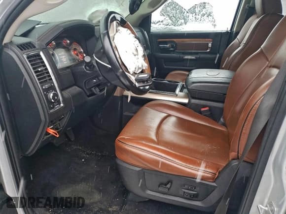 ✅ 2015 Ram 1500 Laramie Longhorn • VIN: 1C6RR7PT4FS509941 • Лот: 92844275. Опубликован ранее на Copart с пробегом 126 978 миль. Бесплатный доступ к архиву аукционных продаж из США и подробный отчёт об истории автомобиля на DreamBid. Изображение 7.