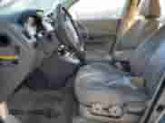 2006 Hyundai Tucson GLS z VIN KM8JN12D56U350295, wystawiony jako Copart lot #77243594 z przebiegiem 192 335 mil mil oraz Szkoda całkowita • Salvage title. Historia ofert i sprzedaży dostępna na DreamBid. Obrazek 7.