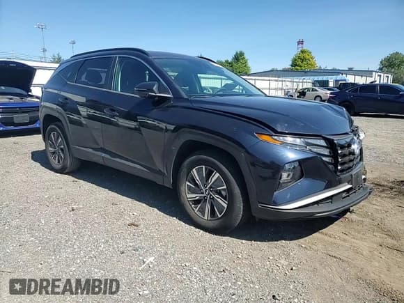 ✅ 2022 Hyundai Tucson Blue • VIN: KM8JBCA18NU030723 • Lot: 70143134. Wystawiony na Copart z przebiegiem 16 700 mil. Bezpłatny archiwum sprzedaży aukcyjnych z USA i szczegółowy raport historii pojazdu na DreamBid. Zdjęcie 12.